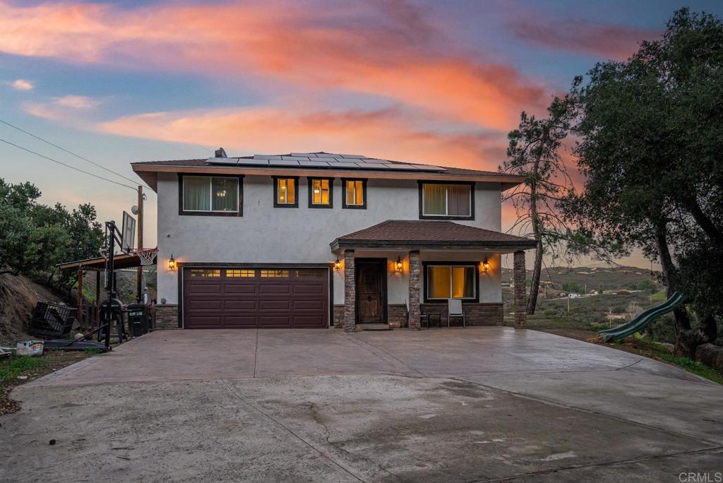 20591 Sycamore Springs Road Jamul, CA 91935 - Photo 42 of 53 a front view of a house with a yard