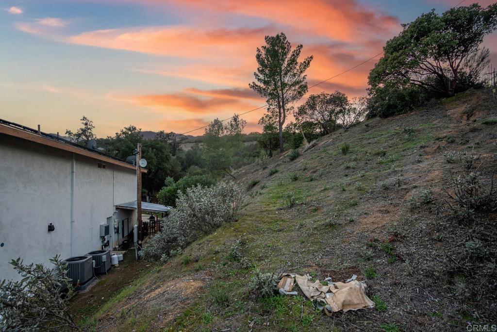 20591 Sycamore Springs Road Jamul, CA 91935 - Photo 53 of 53 a backyard of a house with lots of green space