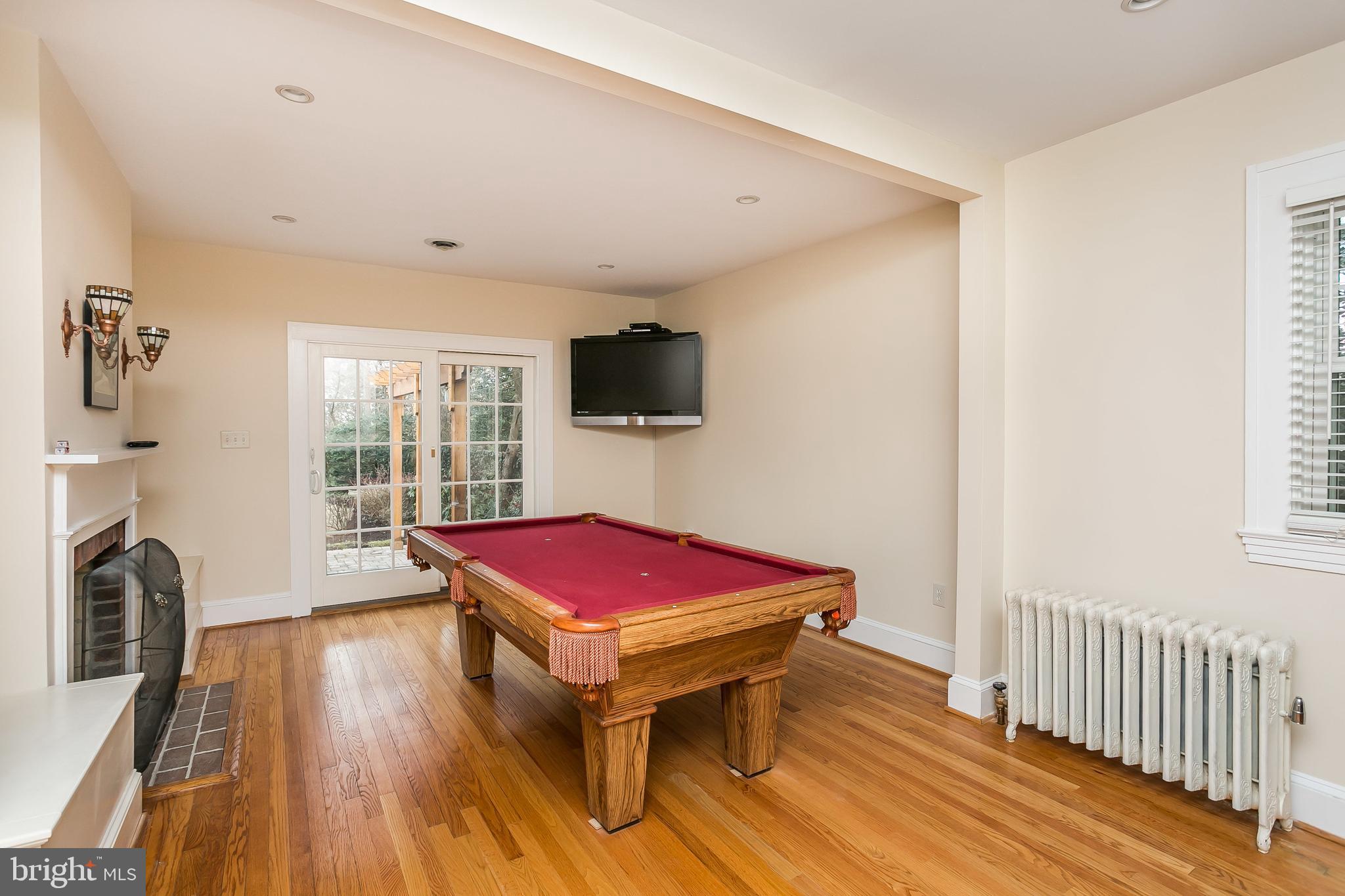 6407 Pinehurst Road Baltimore, MD 21212 - Photo 20 of 50 Game room with access to back yard