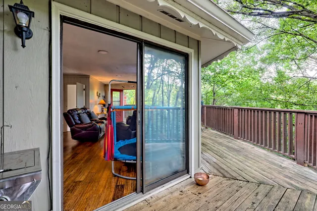 a balcony view with a outdoor seating