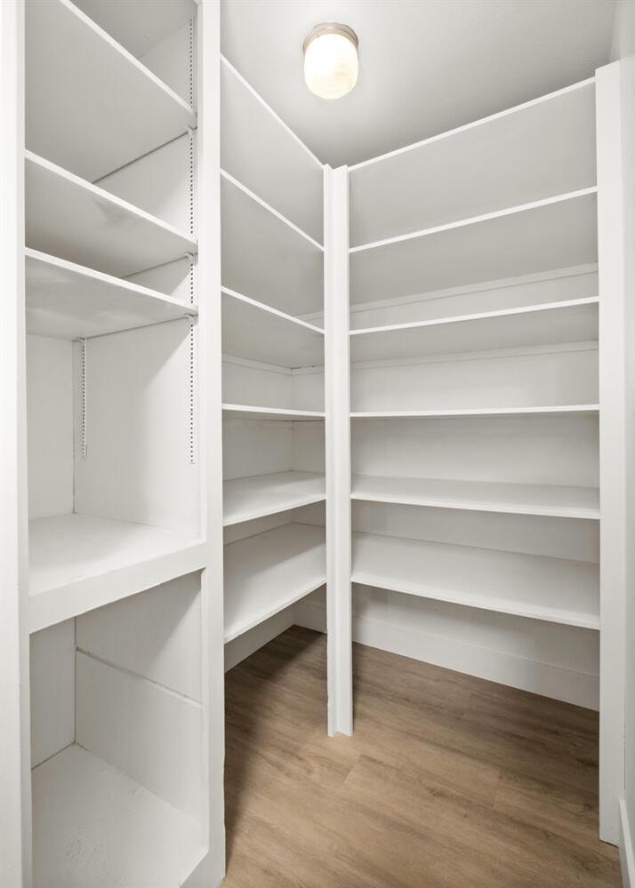 51202 Rusty Lane Oakhurst, CA 93644 - Photo 13 of 27 a view of walk in closet with empty racks