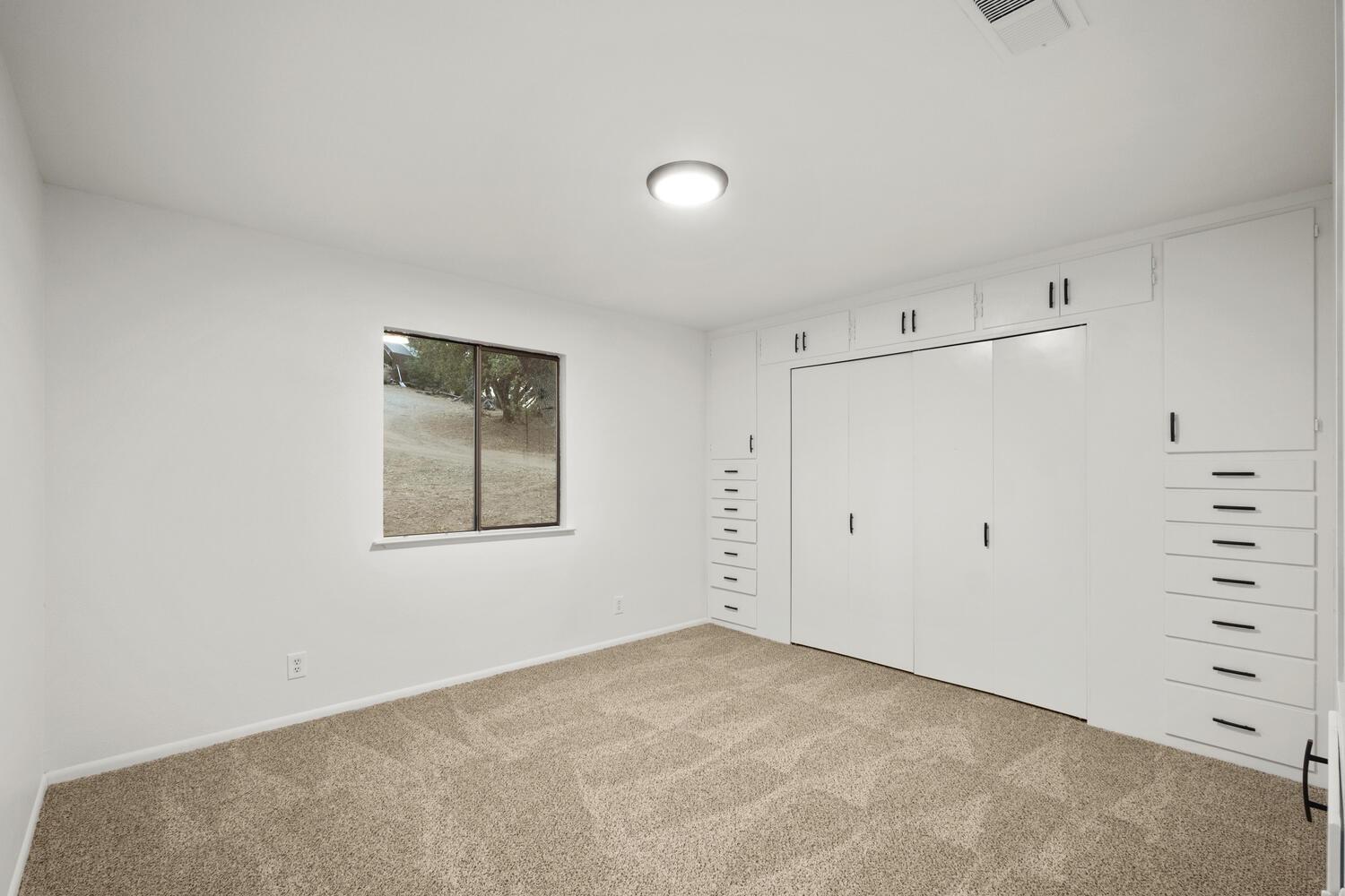 51202 Rusty Lane Oakhurst, CA 93644 - Photo 21 of 27 a view of an empty room
