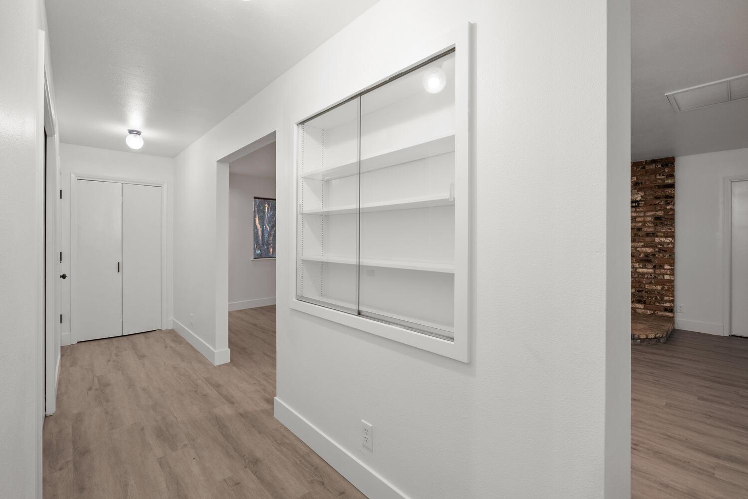 51202 Rusty Lane Oakhurst, CA 93644 - Photo 6 of 27 a view of an empty room with wooden floor and closet