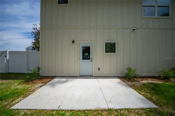 a view of a backyard with a small cabin