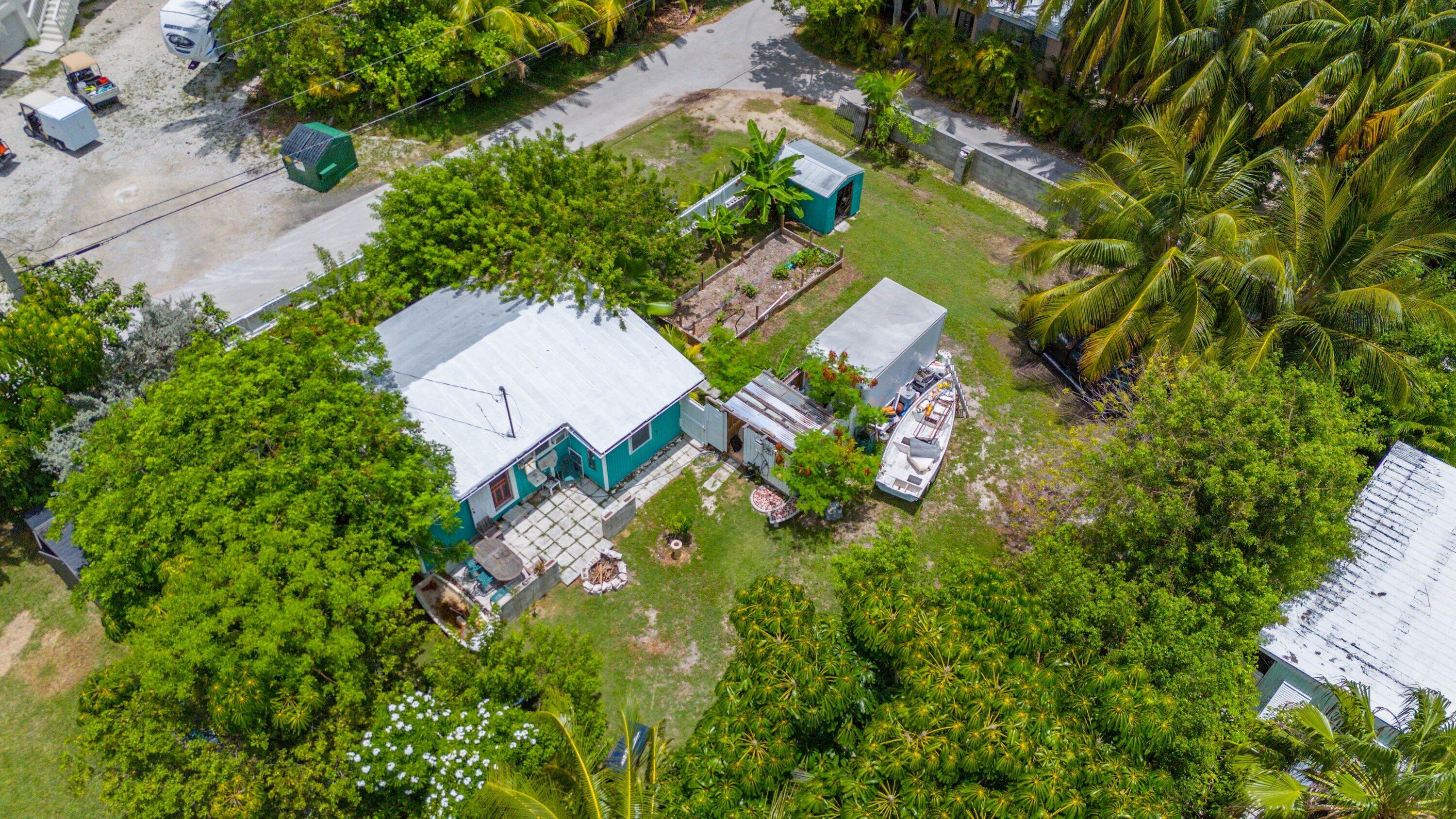 19910 Flamingo Road Sugarloaf, FL 33042 - Photo 14 of 26 an aerial view of a house with a yard