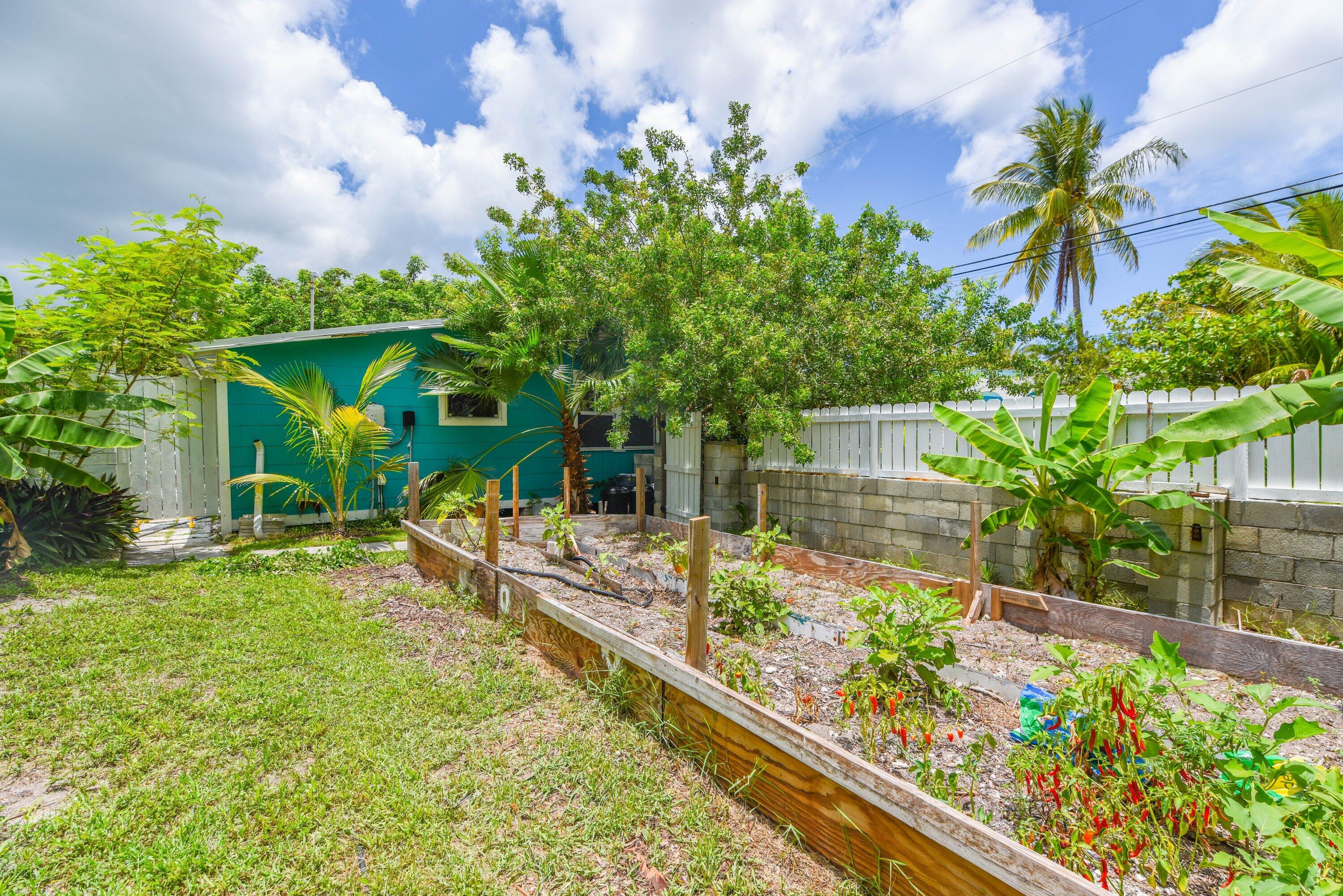 19910 Flamingo Road Sugarloaf, FL 33042 - Photo 15 of 26 a view of house with backyard and sitting area
