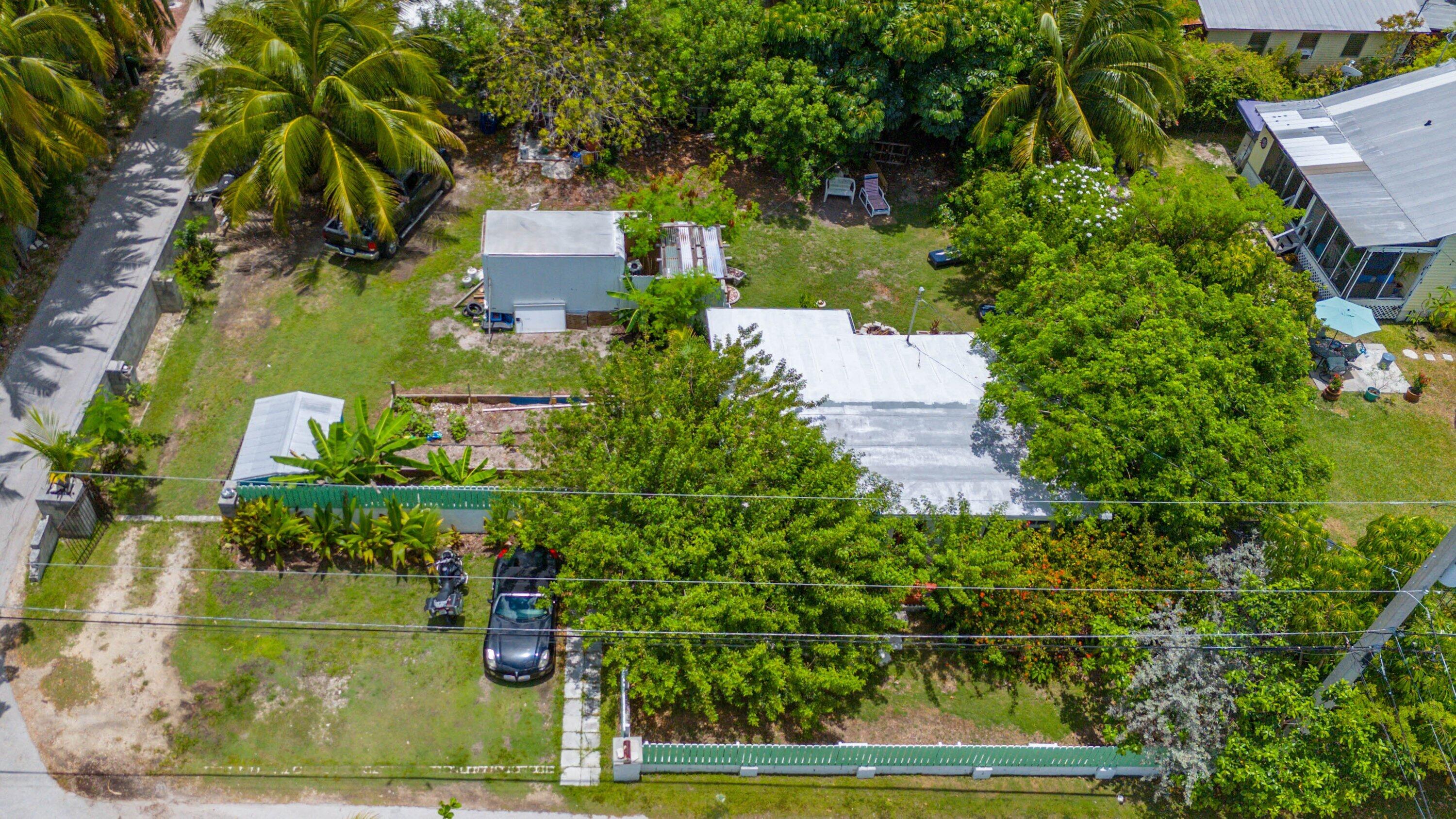 19910 Flamingo Road Sugarloaf, FL 33042 - Photo 19 of 26 an aerial view of a house with a yard basket ball court and outdoor seating