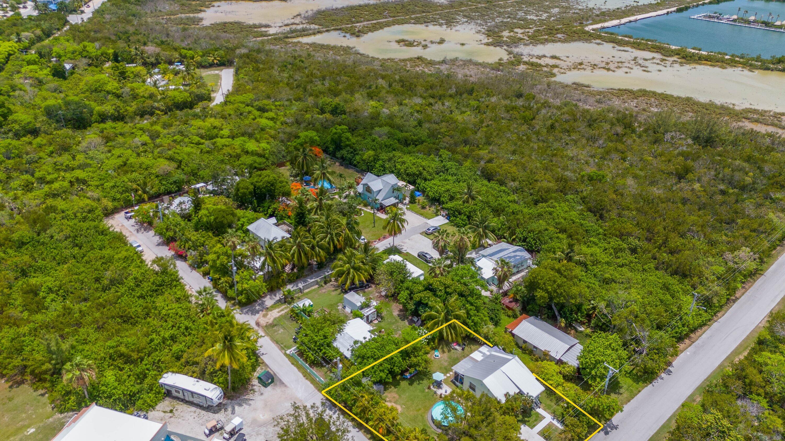19910 Flamingo Road Sugarloaf, FL 33042 - Photo 23 of 26 a view of a garden