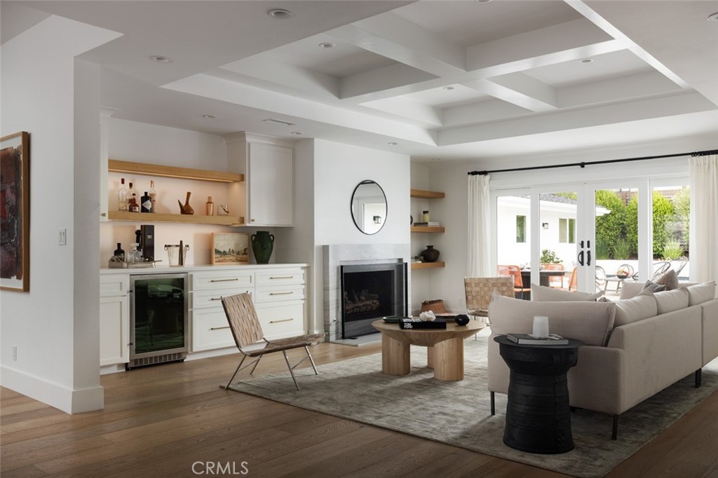1120 Dolphin Terrace Corona del Mar, CA 92625 - Photo 2 of 48 a living room with fireplace furniture and a large window