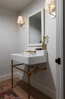 a view of kitchen with furniture and wooden floor