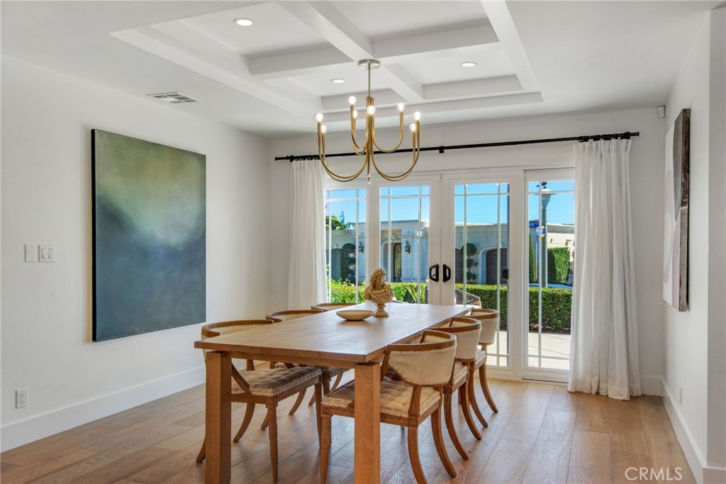 1120 Dolphin Terrace Corona del Mar, CA 92625 - Photo 36 of 48 a view of a dining room with furniture window and wooden floor