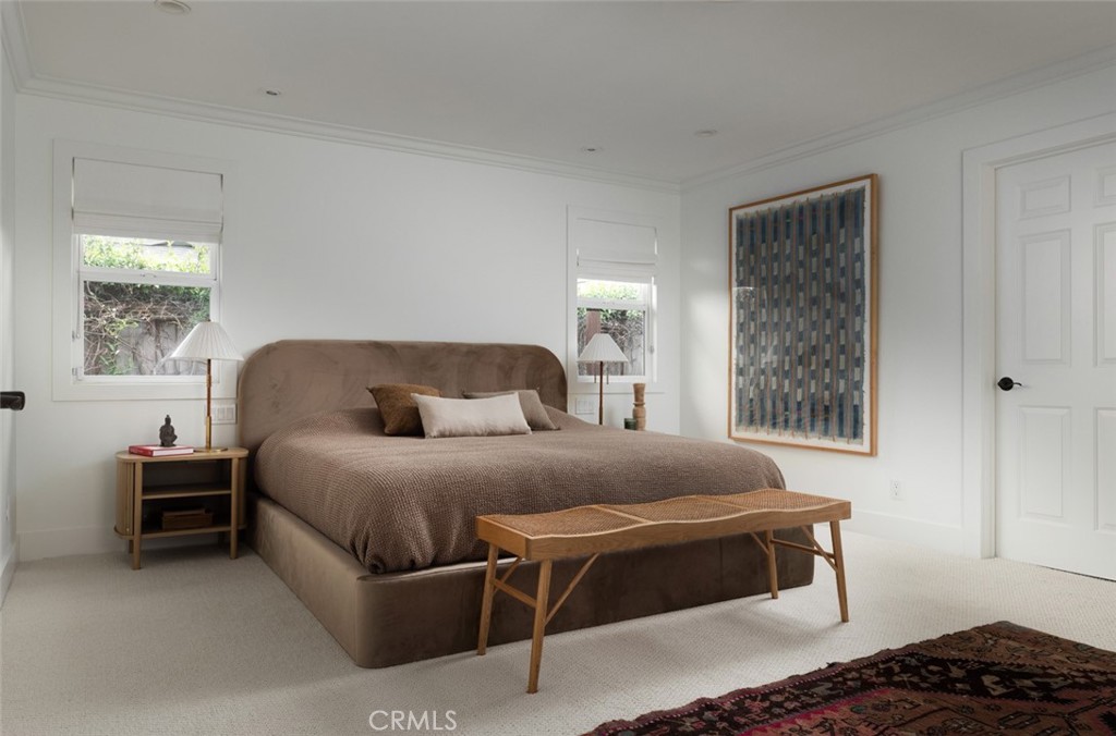 1120 Dolphin Terrace Corona del Mar, CA 92625 - Photo 4 of 48 a bedroom with a bed and window