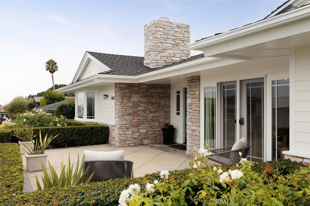 1120 Dolphin Terrace Corona del Mar, CA 92625 - Photo 41 of 48 front view of a house with a yard