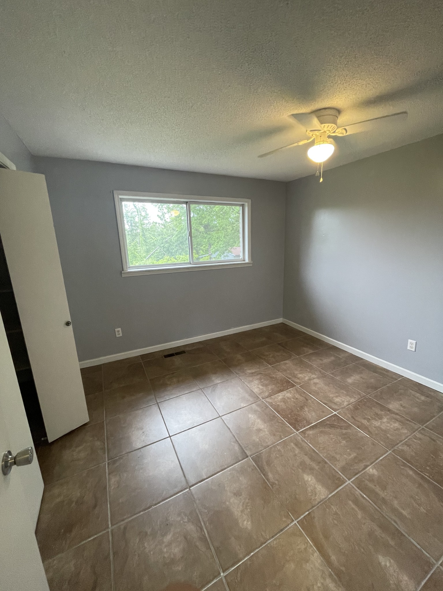 178 Lester Plunk Road Bethel Springs, TN 38315 - Photo 16 of 39 a view of an empty room with a window