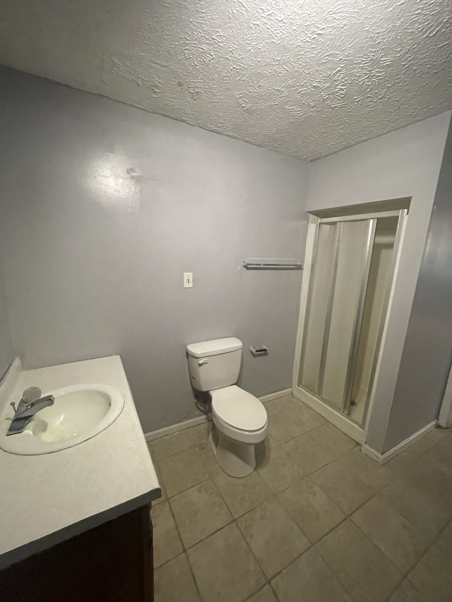 178 Lester Plunk Road Bethel Springs, TN 38315 - Photo 21 of 39 a bathroom with a sink and a toilet