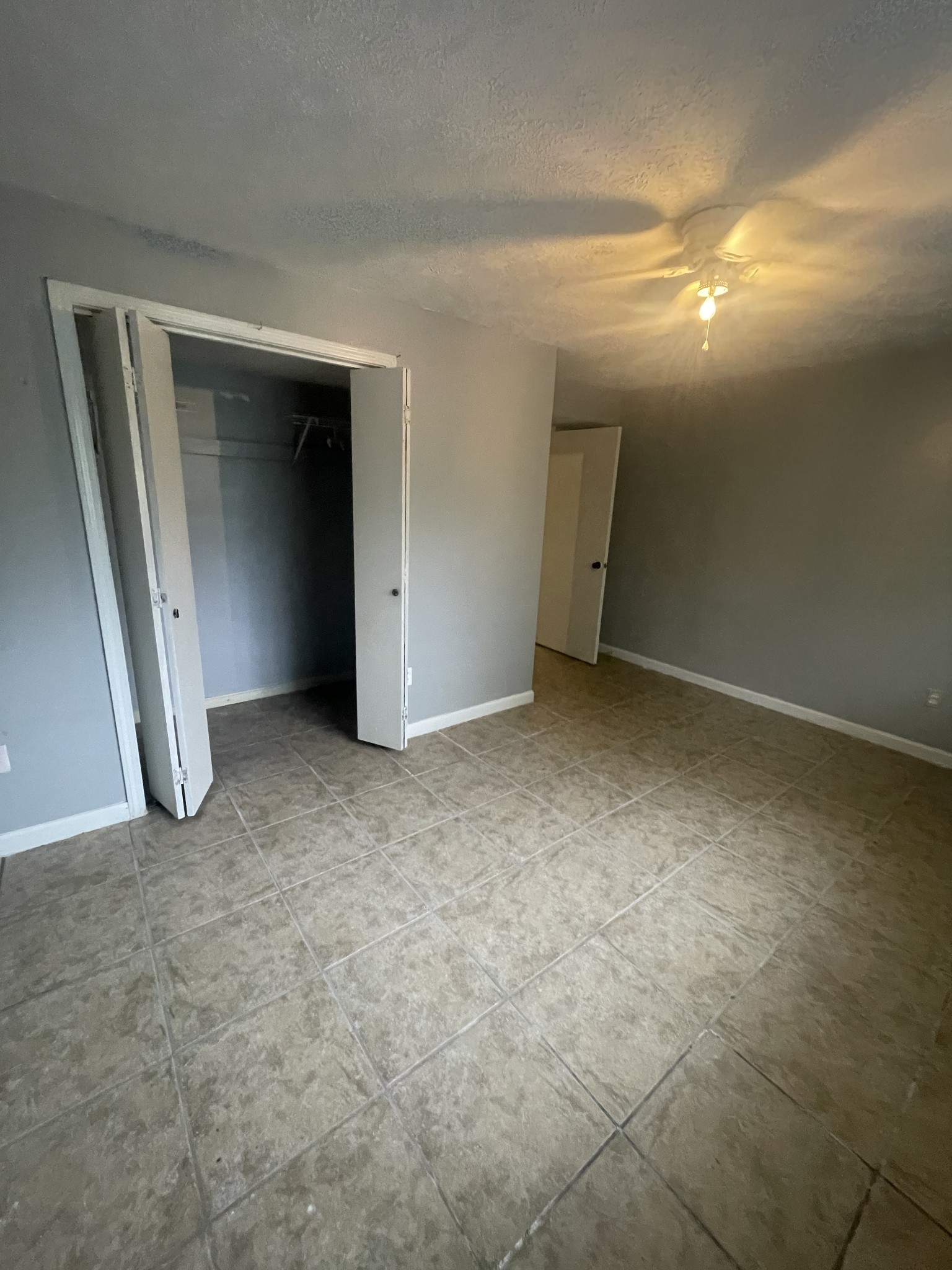 178 Lester Plunk Road Bethel Springs, TN 38315 - Photo 22 of 39 an empty room with closet and mirror