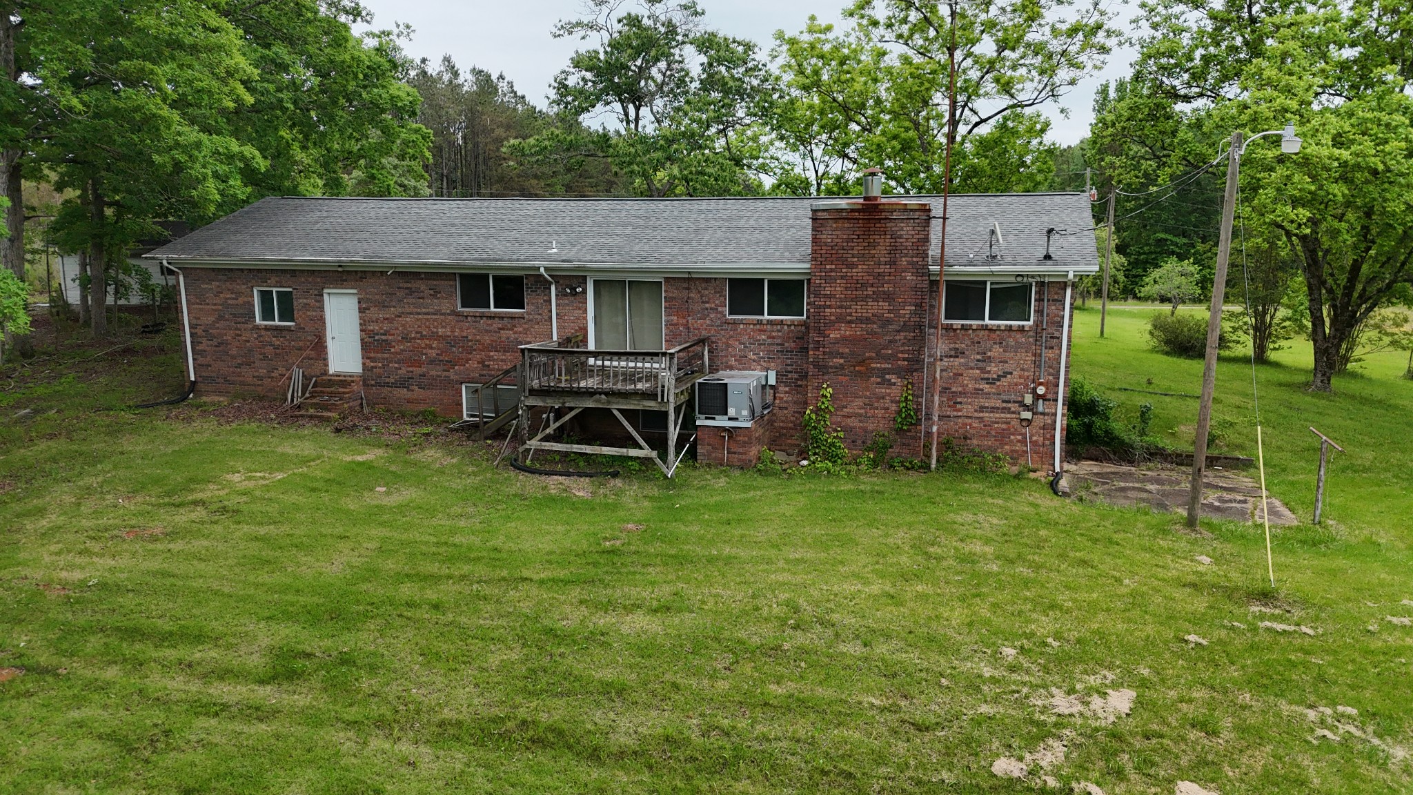 178 Lester Plunk Road Bethel Springs, TN 38315 - Photo 5 of 39 front view of a house with a yard