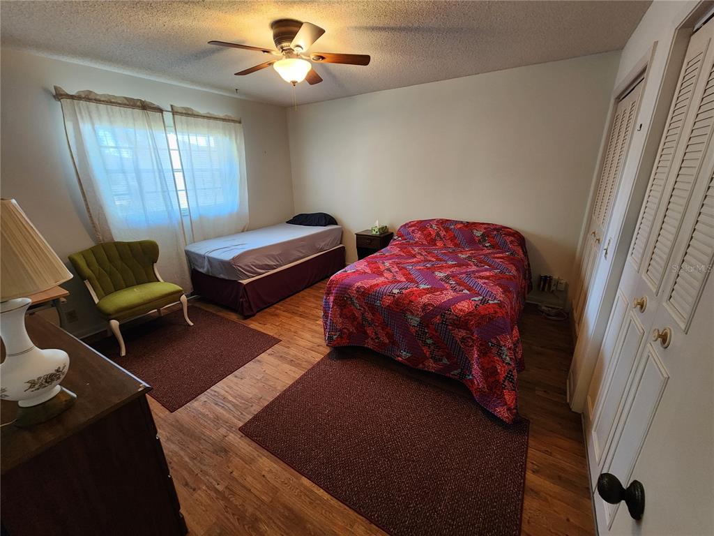 108 Lameraux Road Winter Haven, FL 33884 - Photo 15 of 27 a bedroom with bed and a window