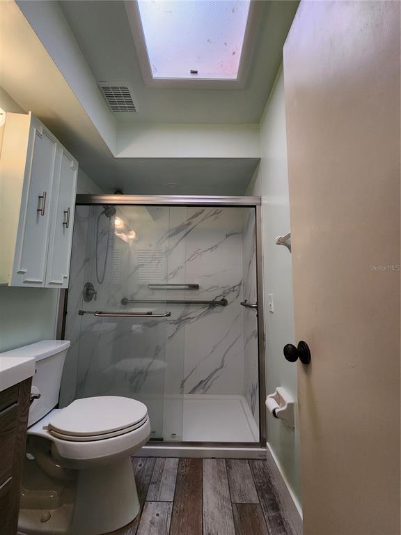 108 Lameraux Road Winter Haven, FL 33884 - Photo 16 of 27 a bathroom with a toilet and a shower