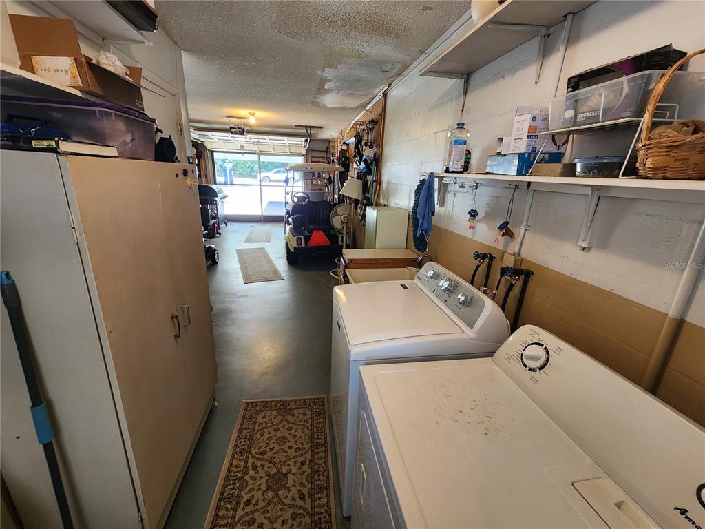 108 Lameraux Road Winter Haven, FL 33884 - Photo 26 of 27 a utility room with dryer and washer