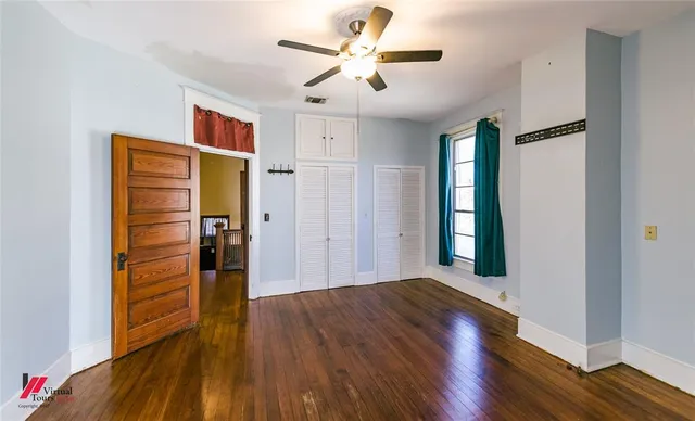 a view of entryway with wooden floor