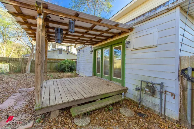 a view of backyard with cabin