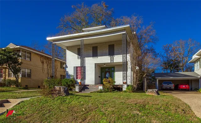 a view of a house with patio