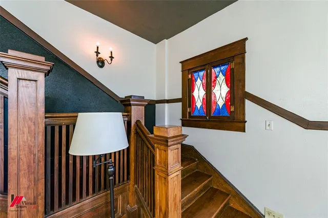 a view of a living room and bathroom