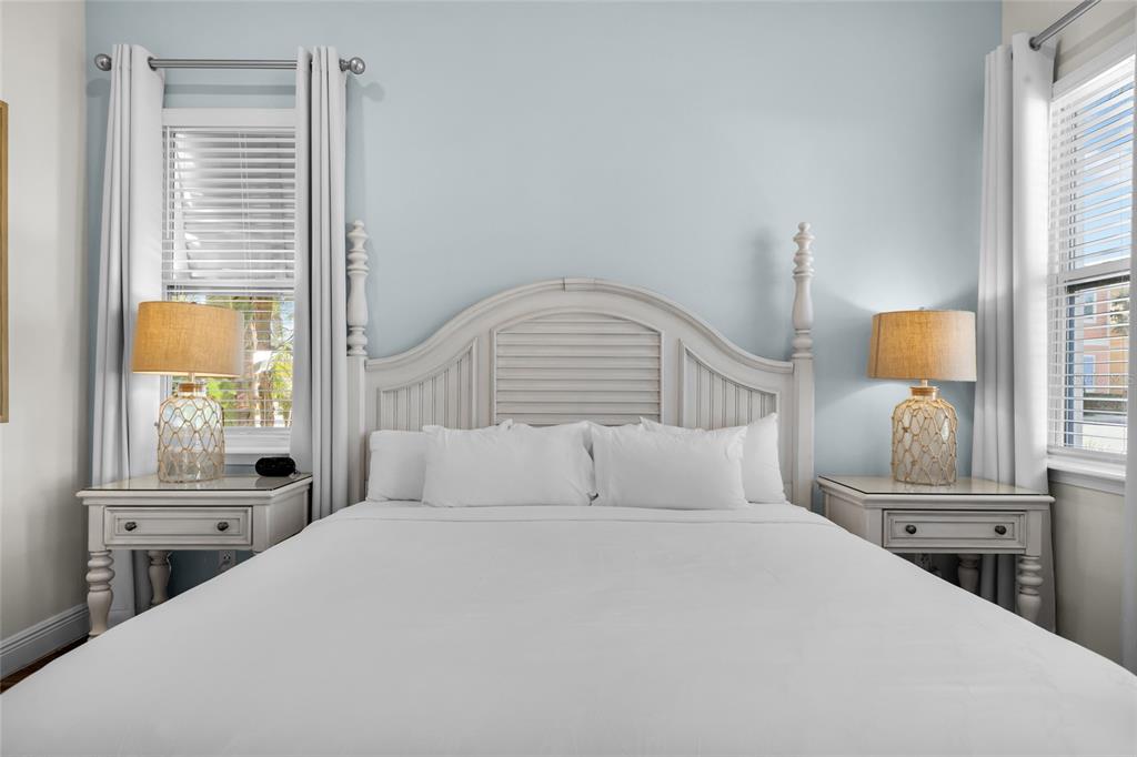 2972 Salted Rim Road Kissimmee, FL 34747 - Photo 14 of 39 a bedroom with a bed and window