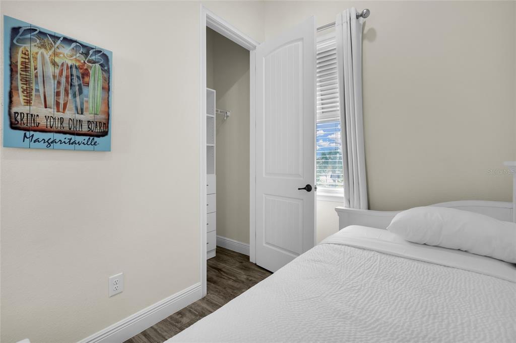 2972 Salted Rim Road Kissimmee, FL 34747 - Photo 29 of 39 a bedroom with a bed and a window