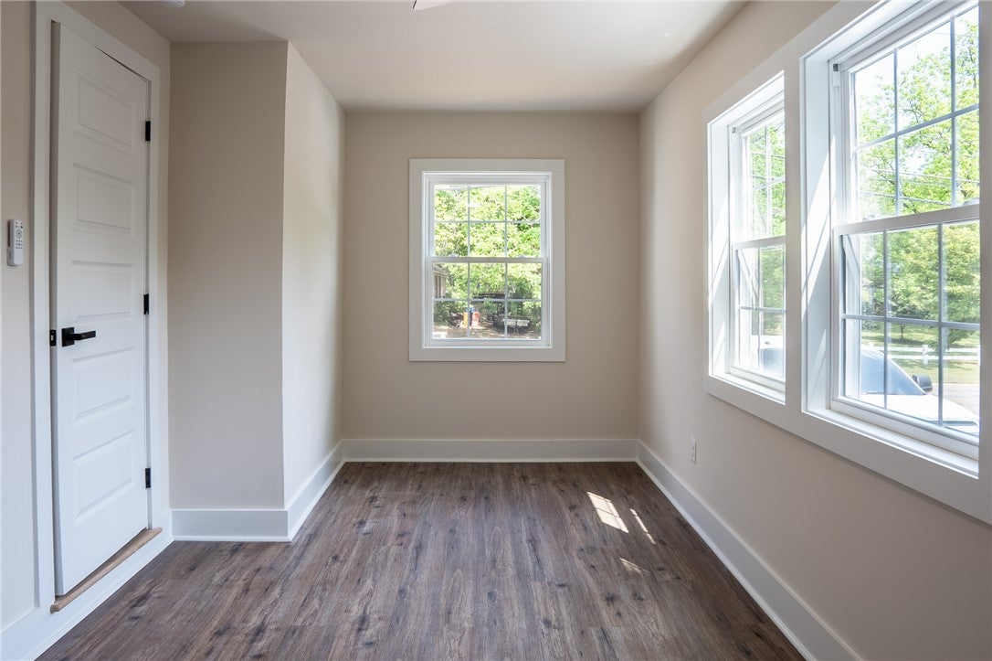 1312 Rocky Brook Road Opelika, AL 36801 - Photo 26 of 45 This bright room features beautiful flooring, large windows, and a classic door.