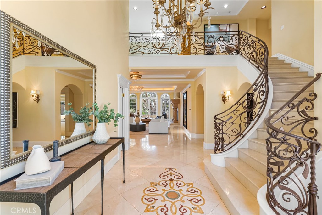 26501 Silver Saddle Lane Laguna Hills, CA 92653 - Photo 12 of 59 a lobby with furniture and wooden floor
