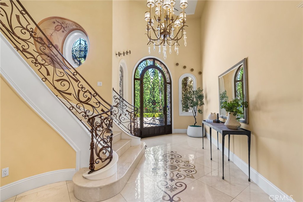 26501 Silver Saddle Lane Laguna Hills, CA 92653 - Photo 13 of 59 a living room with a large window and furniture