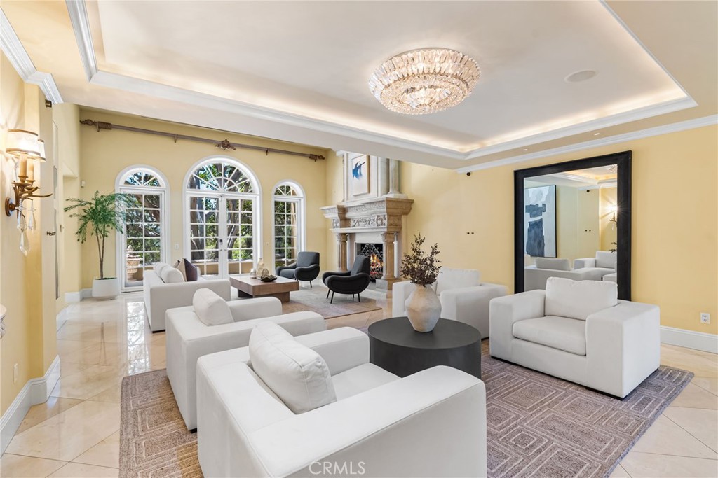 26501 Silver Saddle Lane Laguna Hills, CA 92653 - Photo 17 of 59 a living room with furniture and a large window