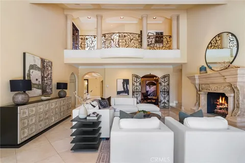 a large bathroom with a double vanity sink a mirror and a bathtub