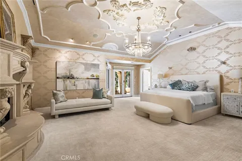 a spacious bathroom with a double vanity sink a mirror and a bathtub