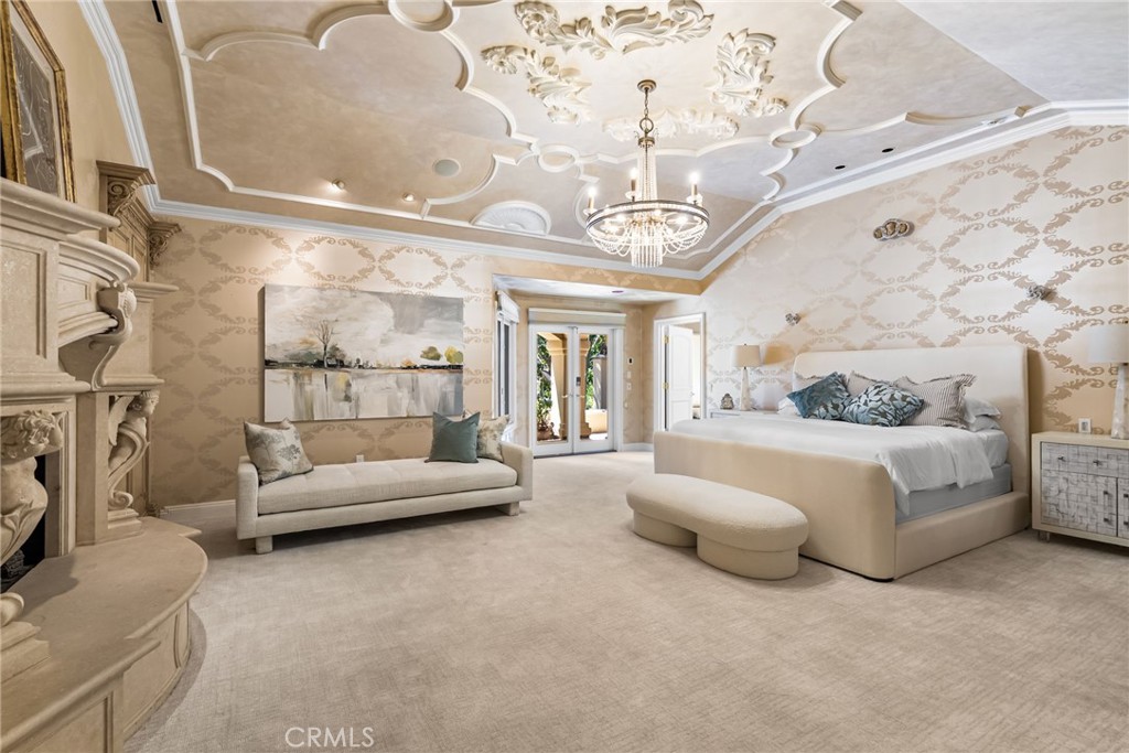 26501 Silver Saddle Lane Laguna Hills, CA 92653 - Photo 29 of 59 a living room with furniture and a chandelier