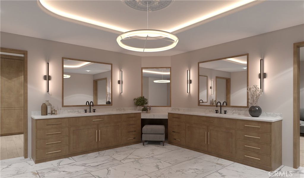 26501 Silver Saddle Lane Laguna Hills, CA 92653 - Photo 32 of 59 a spacious bathroom with a double vanity sink a mirror and a bathtub