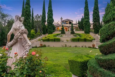 a view of a swimming pool with a yard