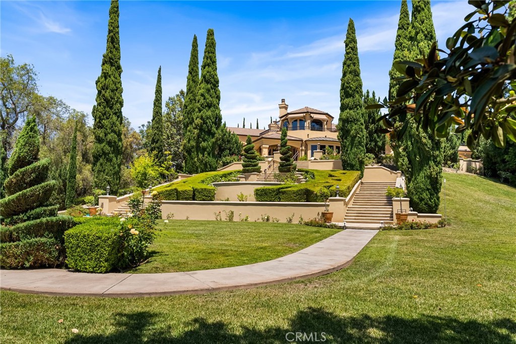 26501 Silver Saddle Lane Laguna Hills, CA 92653 - Photo 37 of 59 a view of a swimming pool with a yard