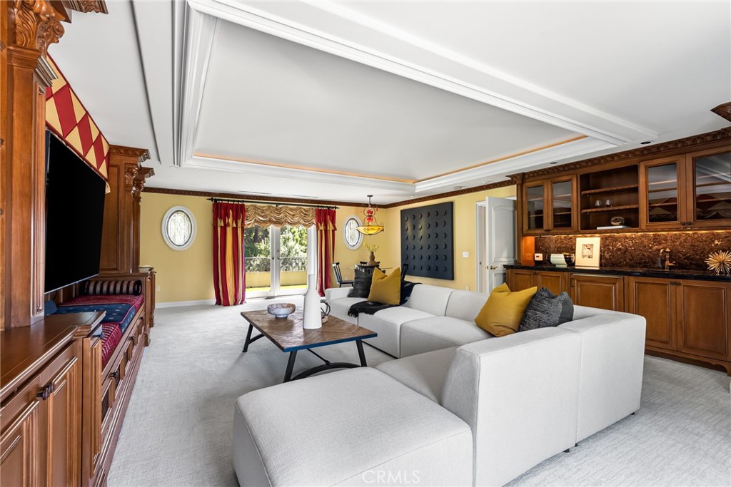 26501 Silver Saddle Lane Laguna Hills, CA 92653 - Photo 54 of 59 a living room with fireplace furniture and a flat screen tv