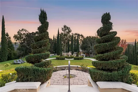 a view of a swimming pool with a garden