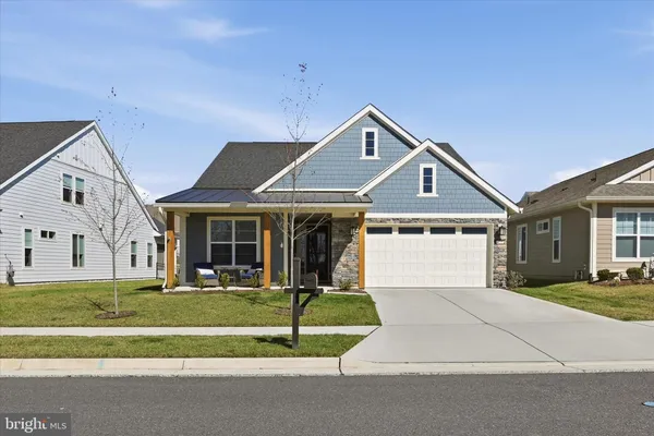 an aerial view of a house with swimming pool