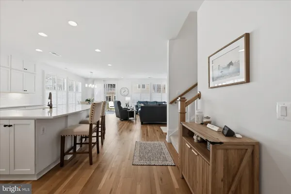 a living room with a fireplace and a flat screen tv