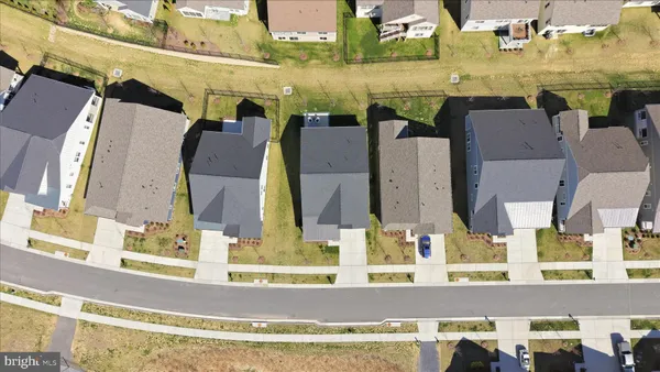 a view of a dining room with furniture and window