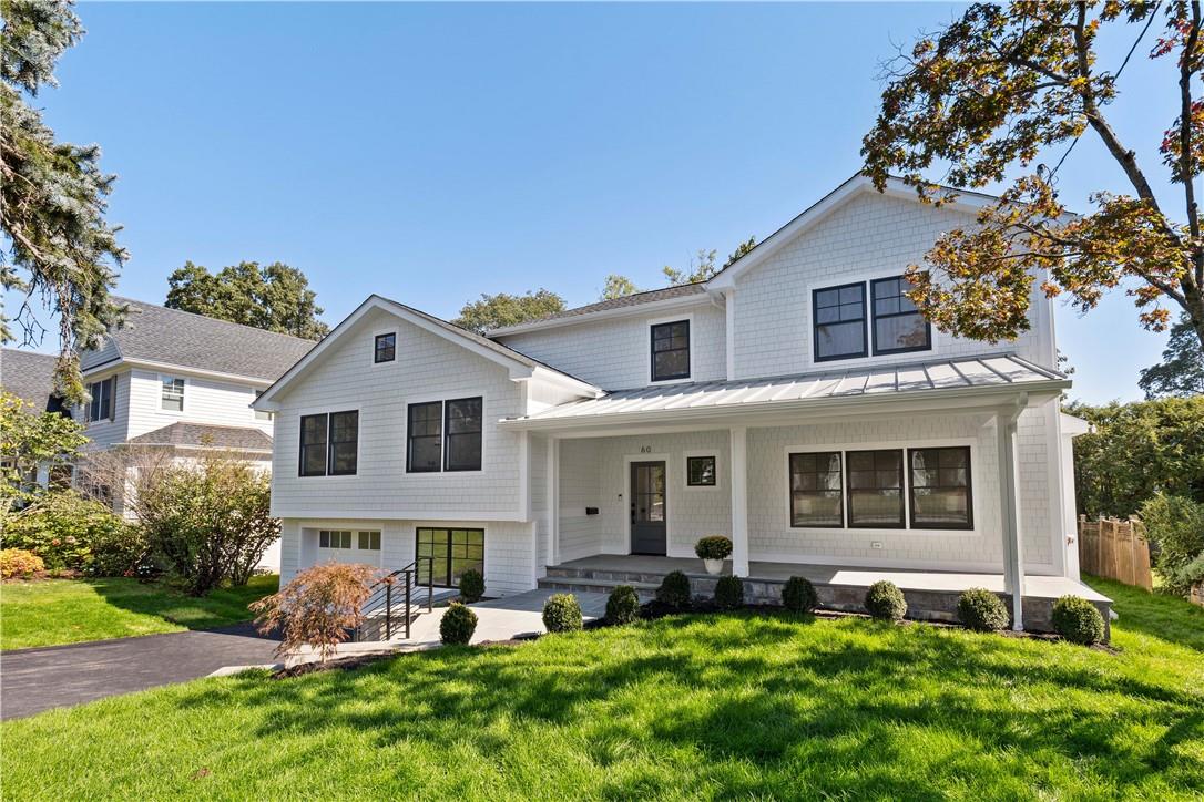60 Fulton Avenue Rye, NY 10580 - Photo 1 of 1 a view of a house with a yard and sitting area
