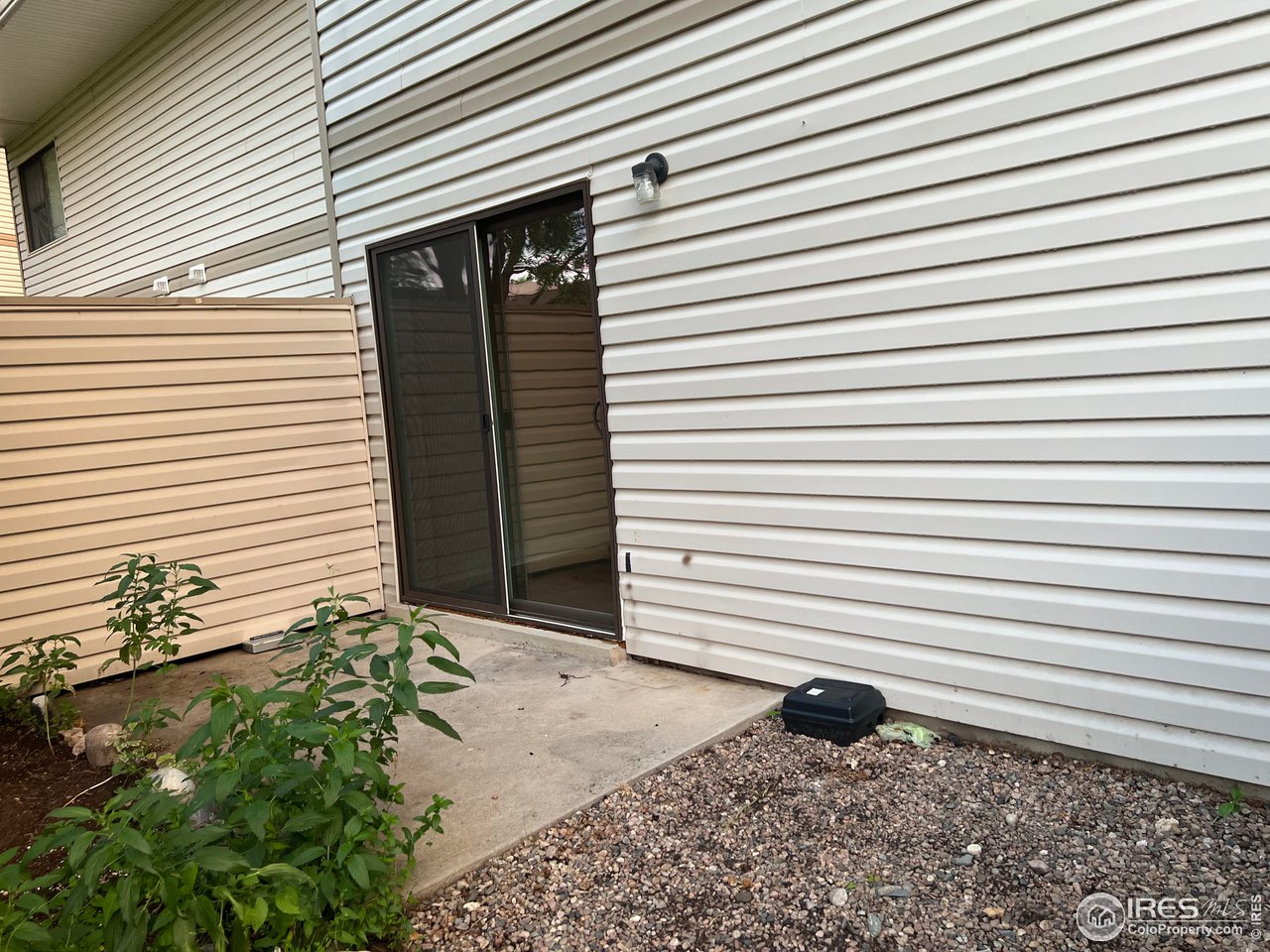 1705 Heatheridge Road, Unit 104 Fort Collins, CO 80526 - Photo 13 of 14 a view of a house with a door