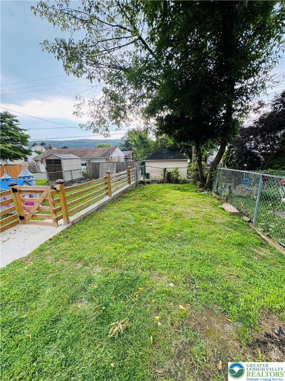 823 Spring Street Bethlehem, PA 18018 - Photo 17 of 39 a swimming pool with outdoor seating and yard