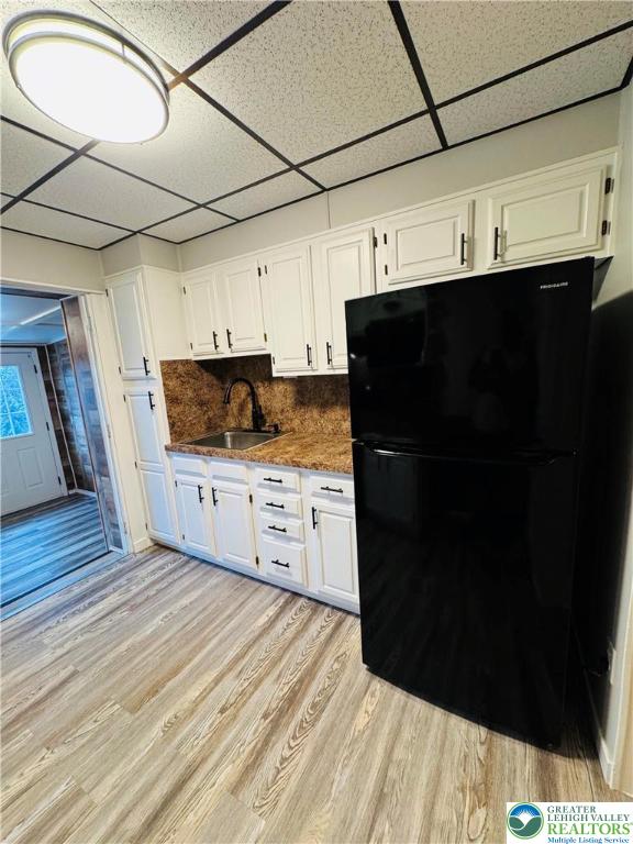 823 Spring Street Bethlehem, PA 18018 - Photo 9 of 39 a kitchen with stainless steel appliances a refrigerator and wooden cabinets
