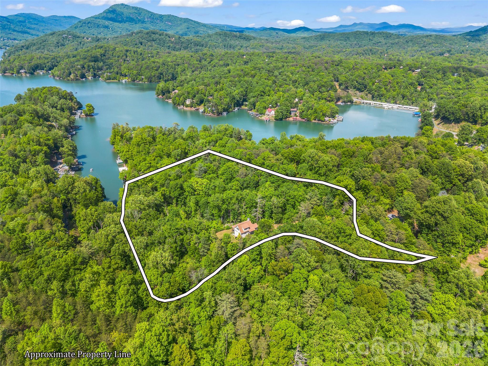 139 Picnic Point Road Lake Lure, NC 28746 - Photo 35 of 41 a view of a tennis court